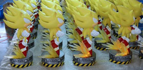 Exclusive super sonic statues lined up in factory, side-view